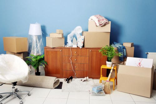 Crystal Palace movers loading household items safely into a moving vehicle
