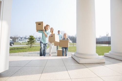 Movers preparing items for collection at the start of a service