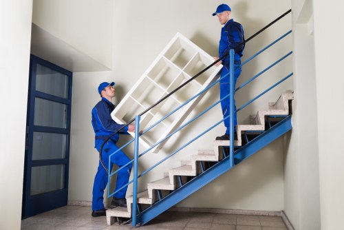 House removal team handling furniture in Crystal Palace