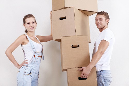 Packed boxes and furniture ready for a residential removal service