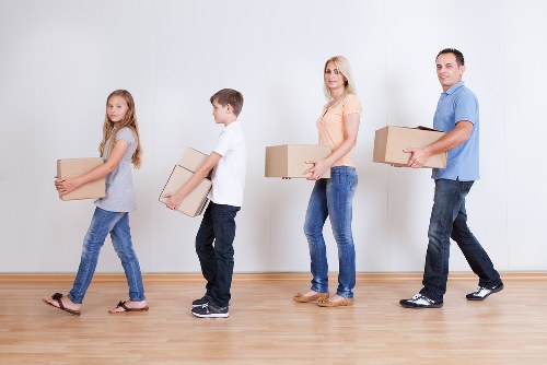 Loading furniture into a removal truck for a south London move